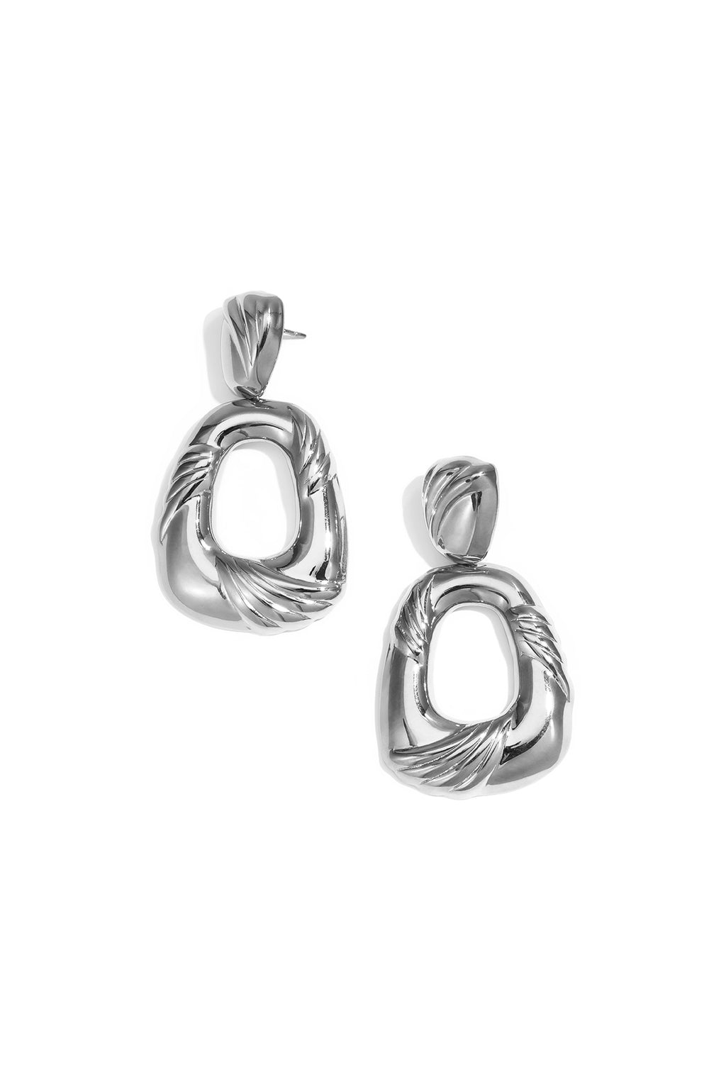 Teardrop-shaped statement earrings with design