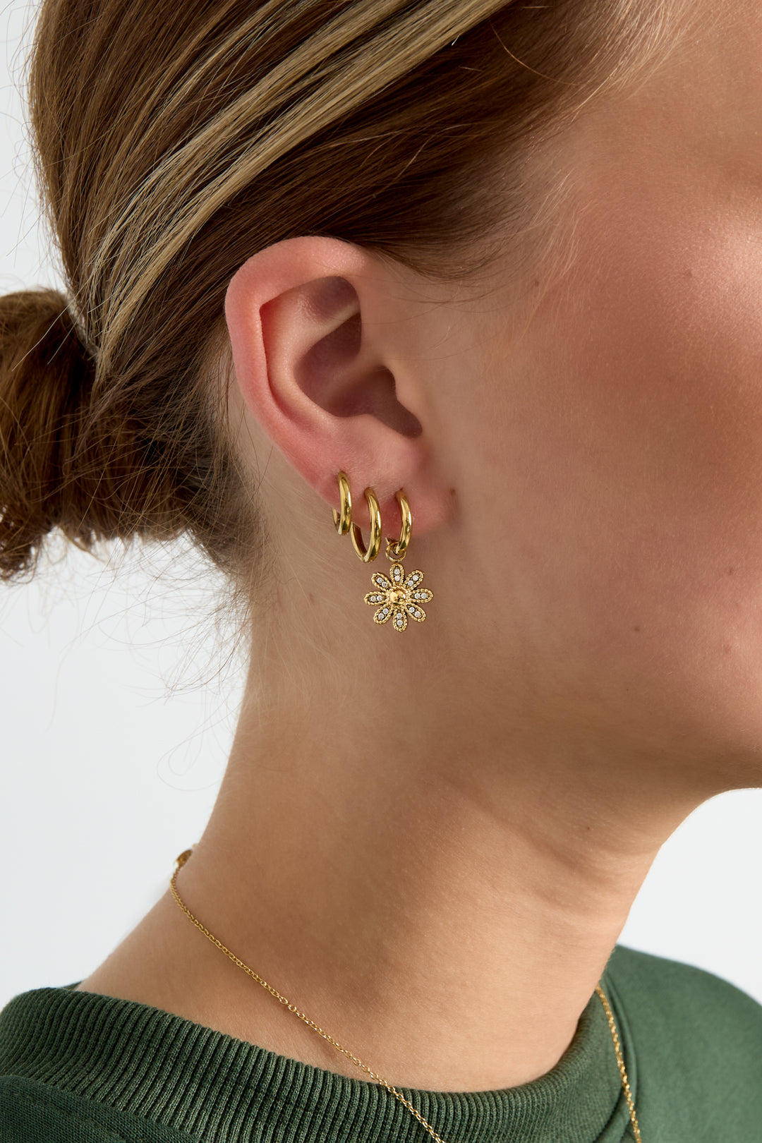 Earrings with decorated hanging flower