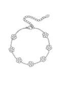 Elegant bracelet with zirconia-set flowers